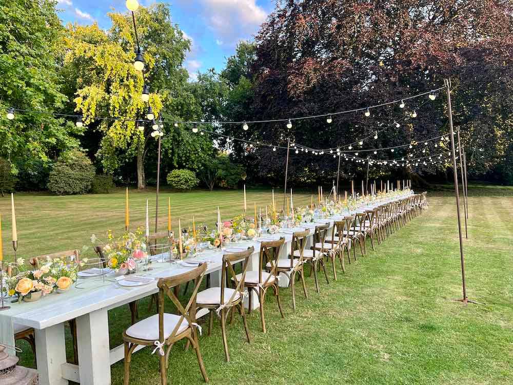 Daytime Delight on the Croquet Lawn: The croquet lawn comes to life in the daylight as preparations for alfresco dining unfold. Tables are set, and the scene is filled with anticipation, creating an inviting atmosphere for a delightful outdoor experience.