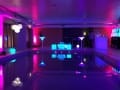 LED Cocktail Bar with LED Furniture and Mood Lighting in a swimming pool.