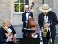 Image of the Cocktail Trio with Sax, Guitar and Double Bass.