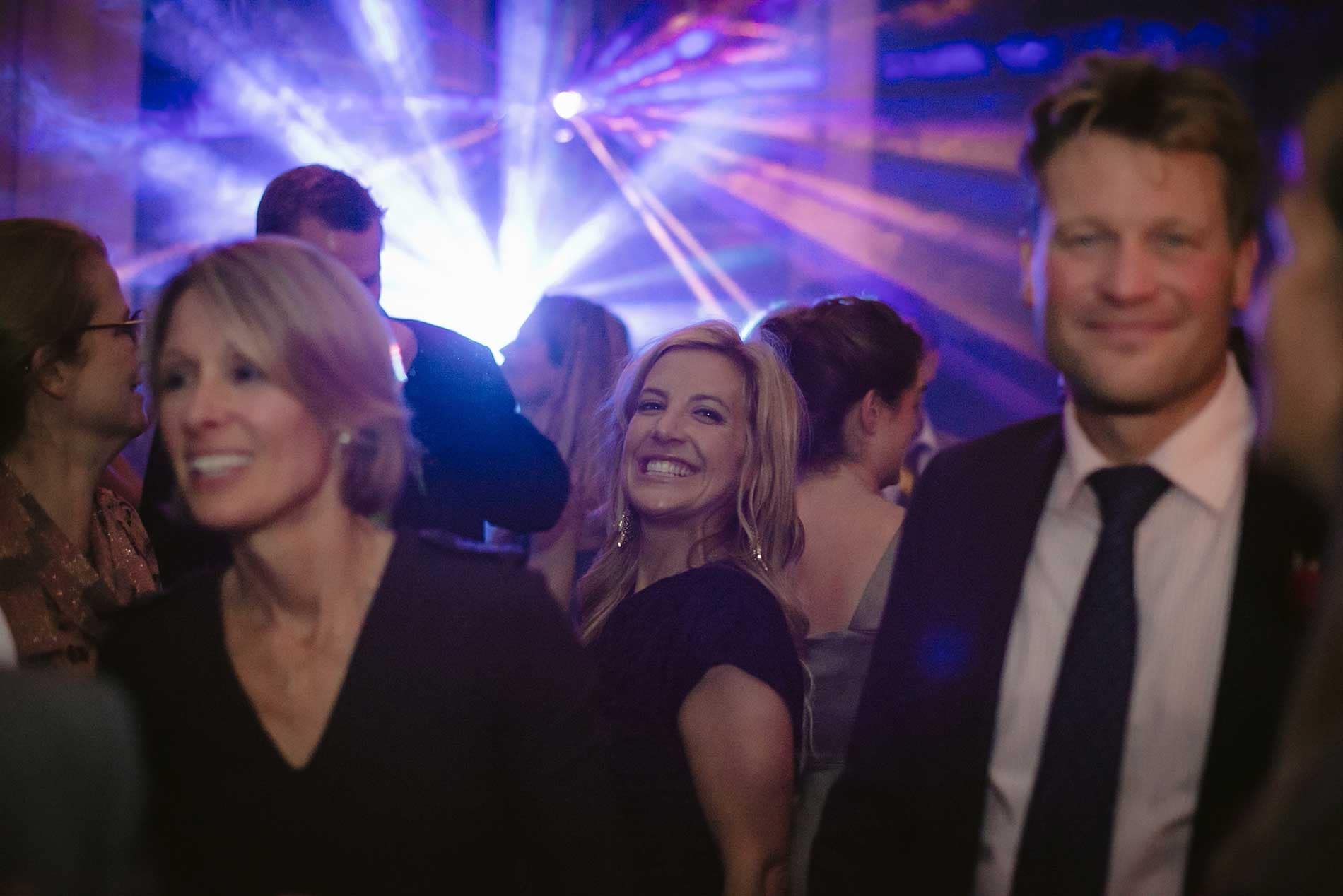 Image of a smiling lady at a wedding