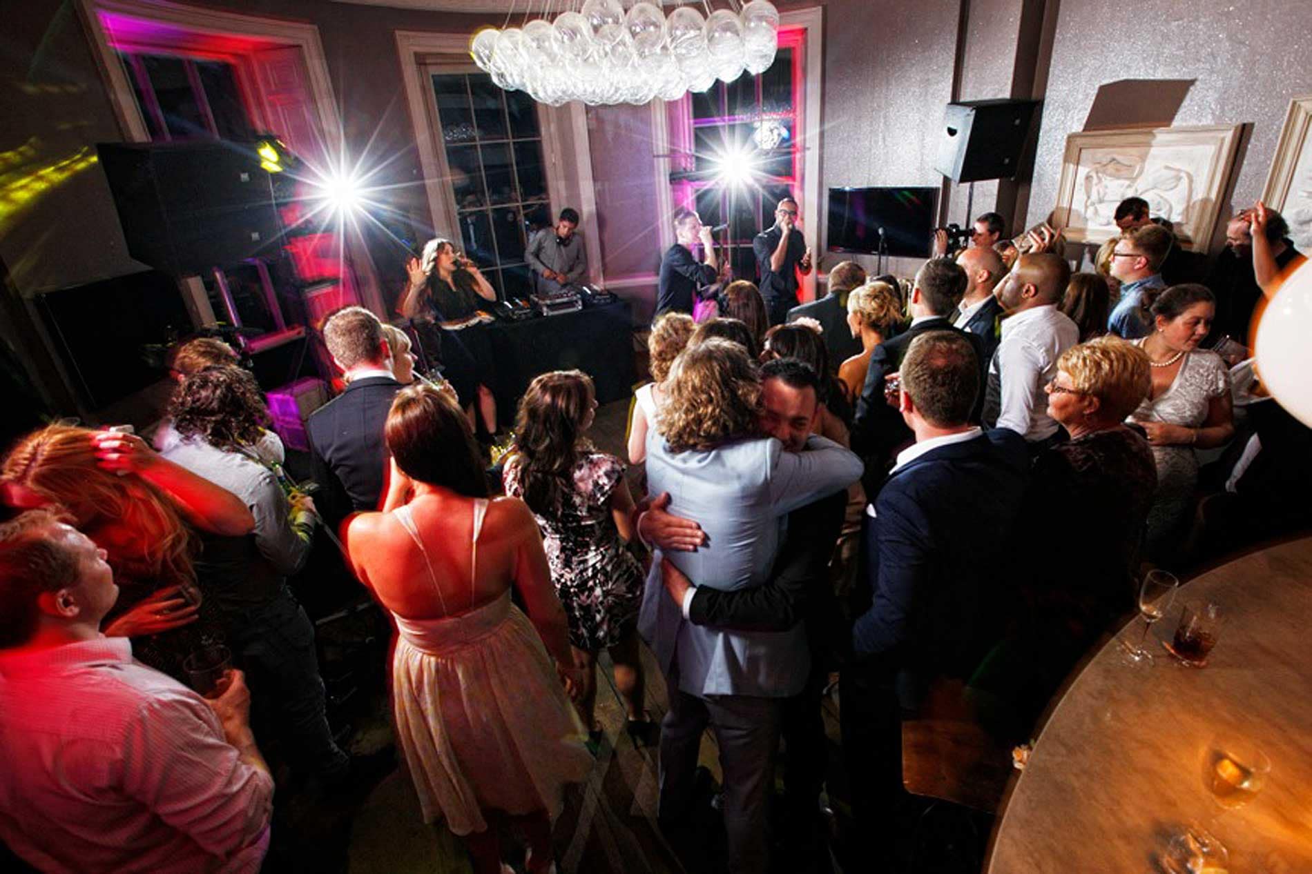 Image of Professor Green performing at Babington House